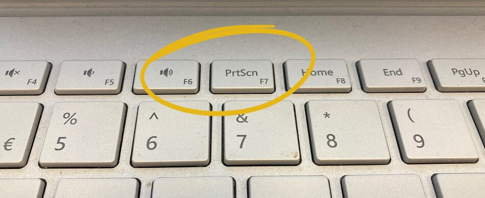 How to take screenshot on a sufacebook keyboard